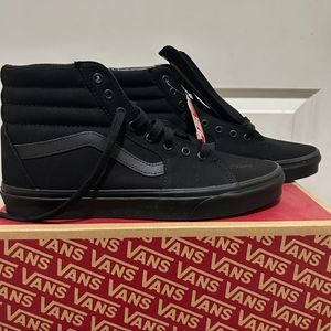 Brand new Vans hightop shoes still in the box with tags